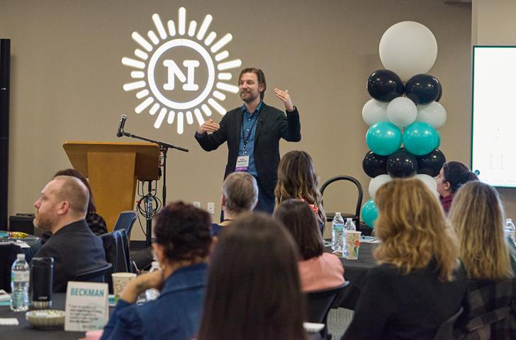 Peter Organisciak speaks in front of a room of seated educators during the Invention Education Leadership Summit
