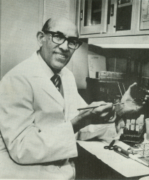 Welton I. Taylor working in a lab