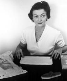Marion Donovan at a desk with a 'Boater' diaper cover