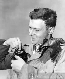 Paul B. MacCready putting on flying gear